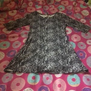 Too small and never wore it!